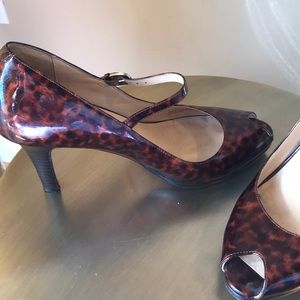 Cole Haan patent leather peep toe pumps